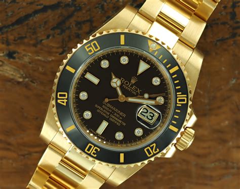 18k gold rolex submariner.